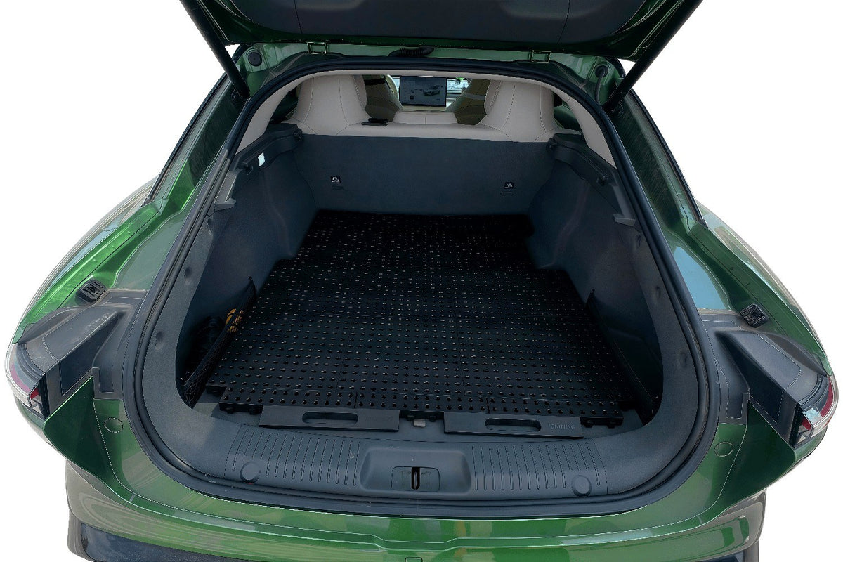 Green SUV trunk with beige interior and TONGJING modular cargo organizer grid