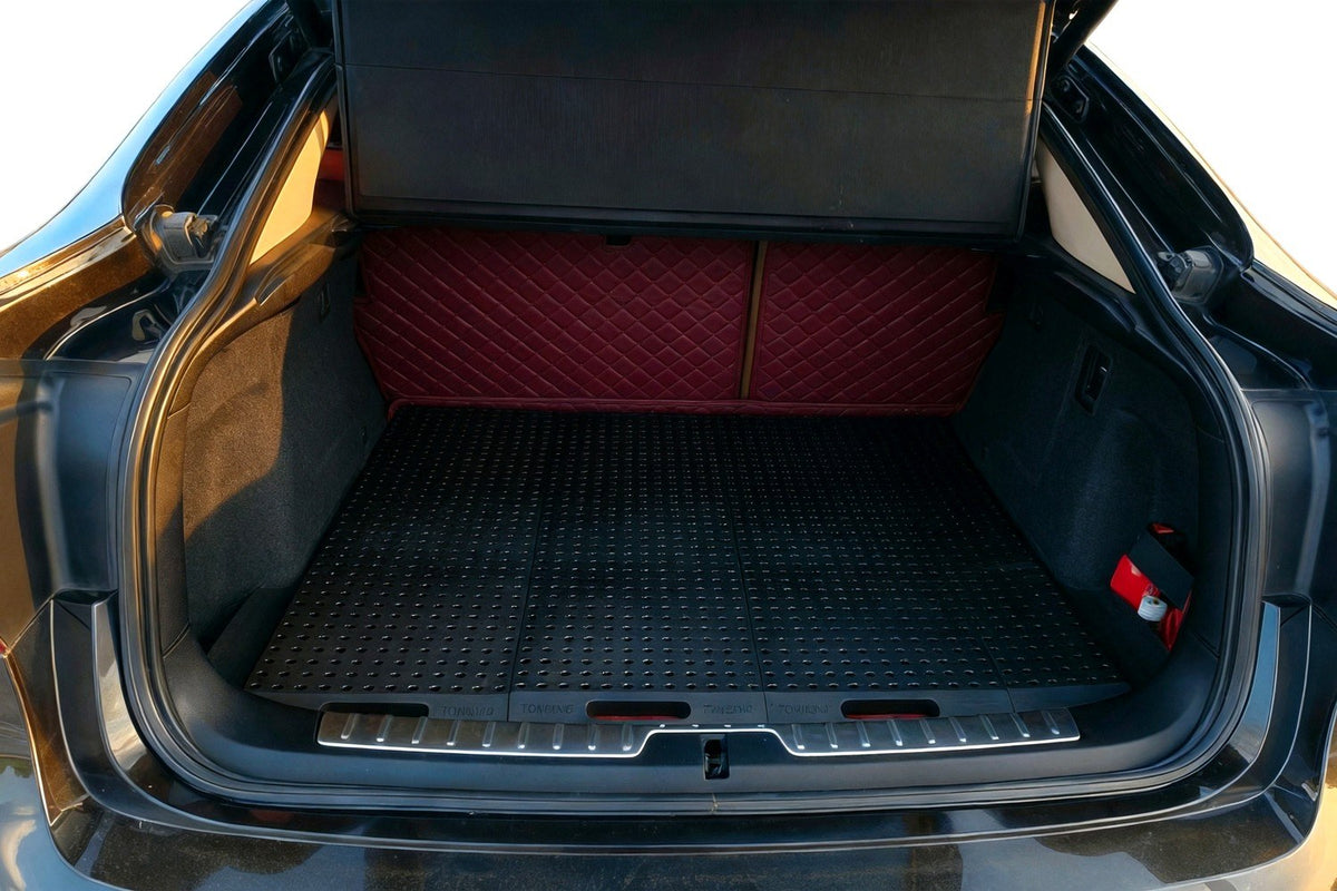 Black SUV cargo area with TONGJING modular organizer grid and maroon quilted seat back